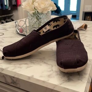 Lightly used Black Toms